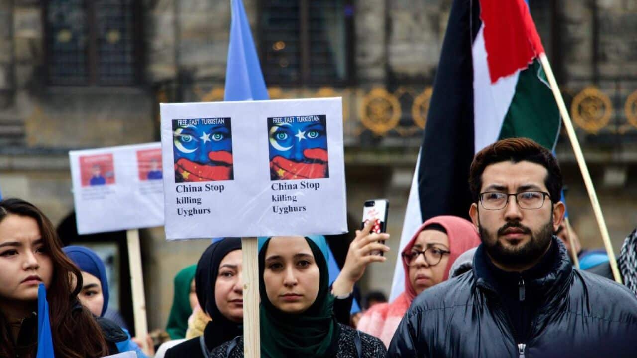 People in Amsterdam protest the treatment of the Uighurs.