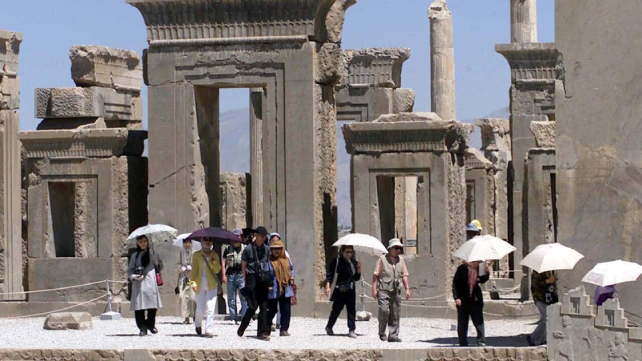 A group of Japanese tourists visit Iran's Persepolis, Shiraz