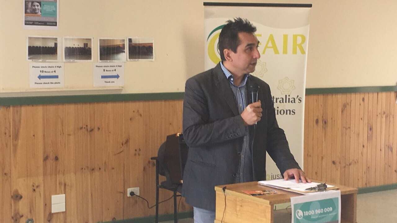 Kuranda Seyit speaking at the forum