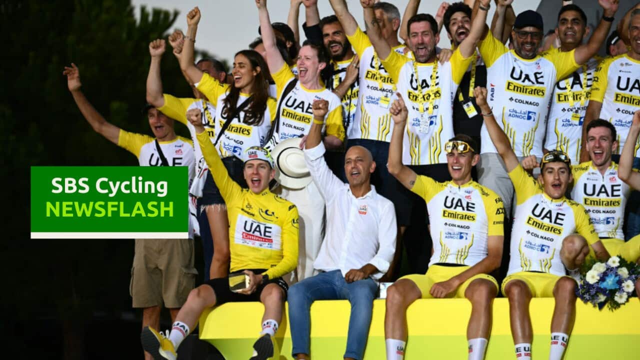 UAE Team Emirates team's Slovenian rider Tadej Pogacar (bottom L) sits next to UAE Team sports manager Joxean Fernandez as he celebrates his overall victory with teammates and staff members after the 21st and final stage of the 111th edition of the Tour de France cycling race, a 33,7 km individual time-trial between Monaco and Nice, on July 21, 2024. (Photo by Marco BERTORELLO / AFP) (Photo by MARCO BERTORELLO/AFP via Getty Images)