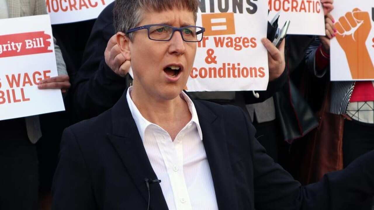 Sally McManus speaks during a rally at Parliament House in Melbourne.