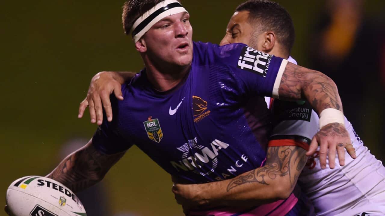 Josh McGuire (left) of the Broncos