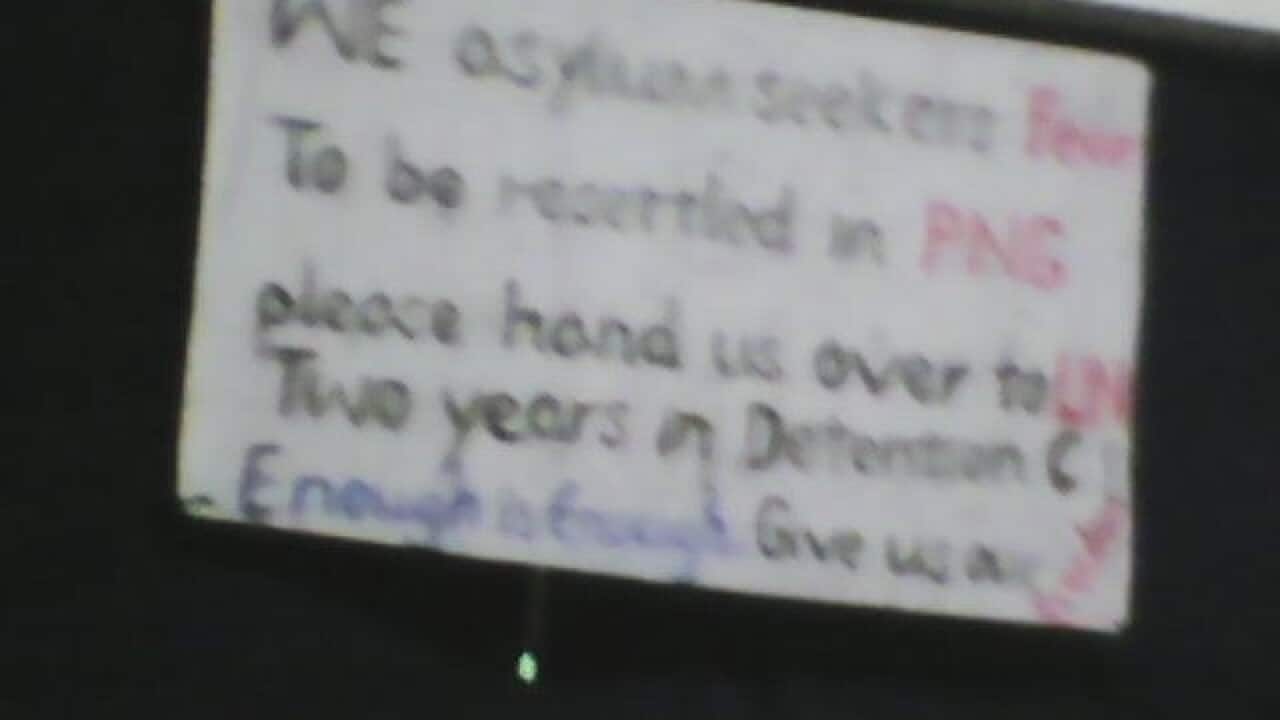 A supplied image obtained January 14, 2015 of an asylum seeker on Manus Island's protest claims.