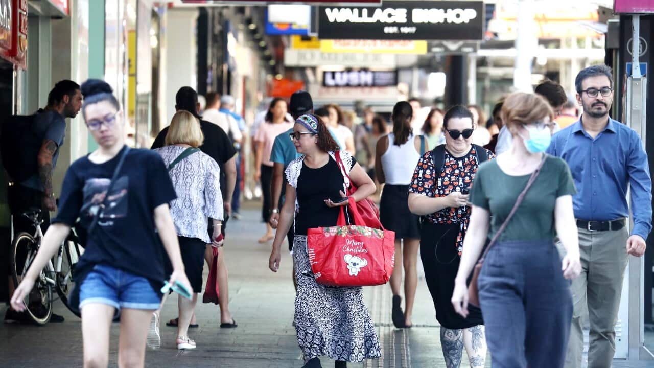 People walking along a footpath.