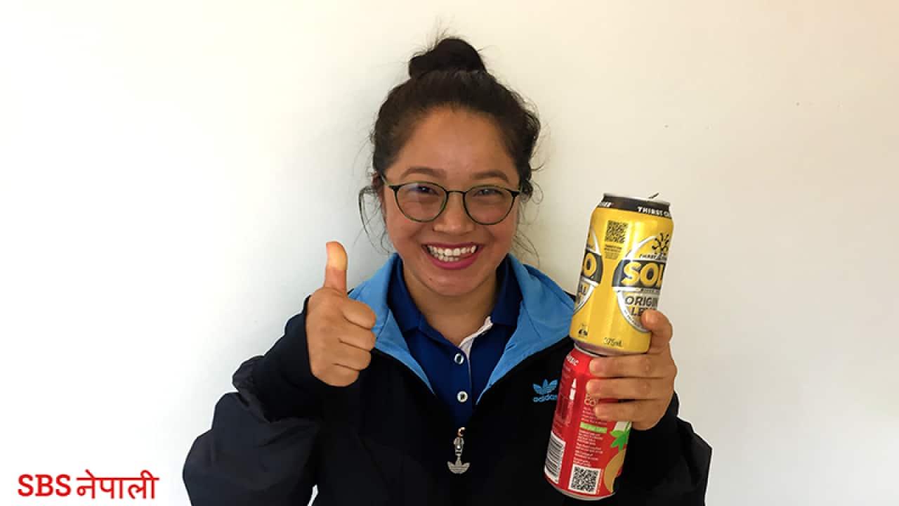 Nisha Ghale collects empty cans for a noble cause