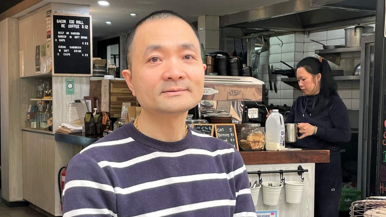 Daen Xu and his wife Dana at their Sydney cafe.