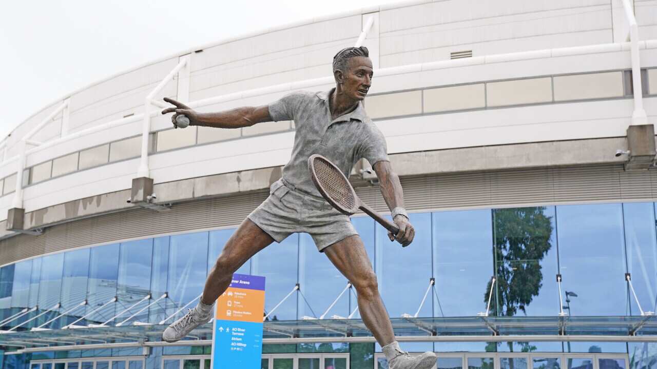 A statue of Rod Laver is seen outside of Rod Laver Arena inside of Melbourne Park ahead of next months Australian Open tennis tournament, in Melbourne, Friday, January 29, 2021. (AAP Image/Scott Barbour) NO ARCHIVING
