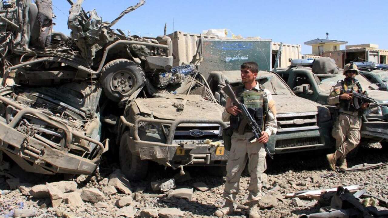 The Taliban has attacked a government compound in Afghanistan, killing three people and wounding 60