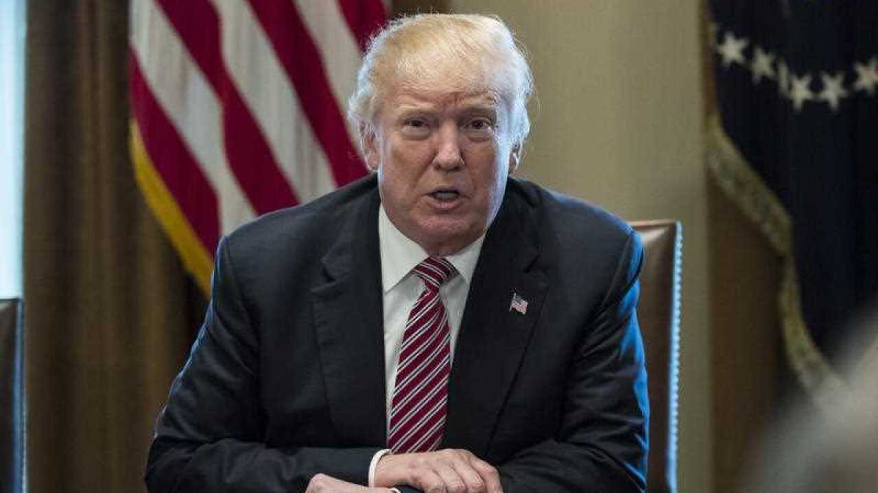 President Donald Trump speaks to media during a meeting with bipartisan Members of Congress about infrastructure in the Cabinet Room of the White House in Washington, Wednesday, February 14, 2018.