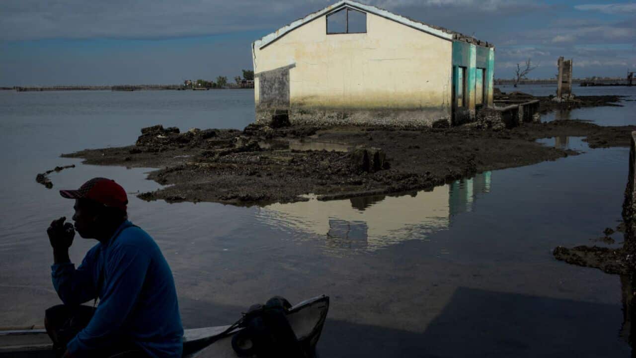 Sea water engulfs houses, buildings and schools in the Phillipines.