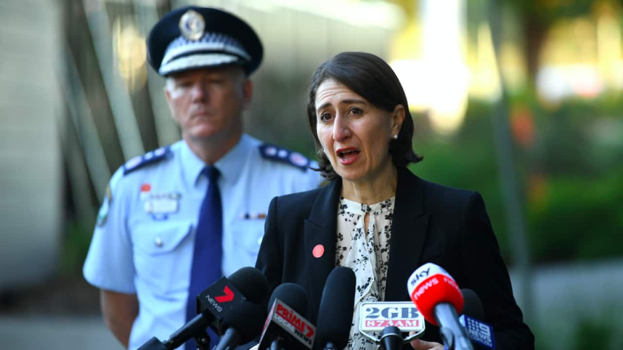 NSW Premier Gladys Berejiklian (right) and NSW Police Commissioner Mick Fuller speak to the media during a press conference