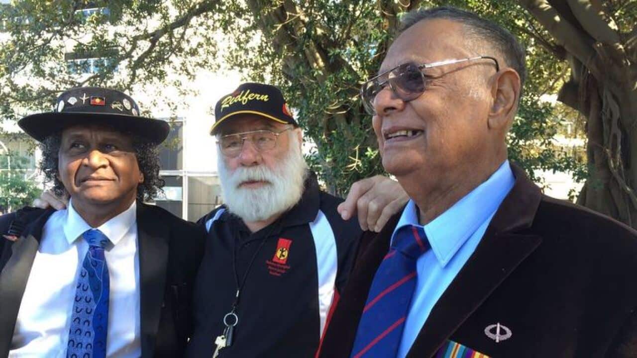 Ray Minniecon, co-founder of Coloured Diggers March, (L) with participants of the March