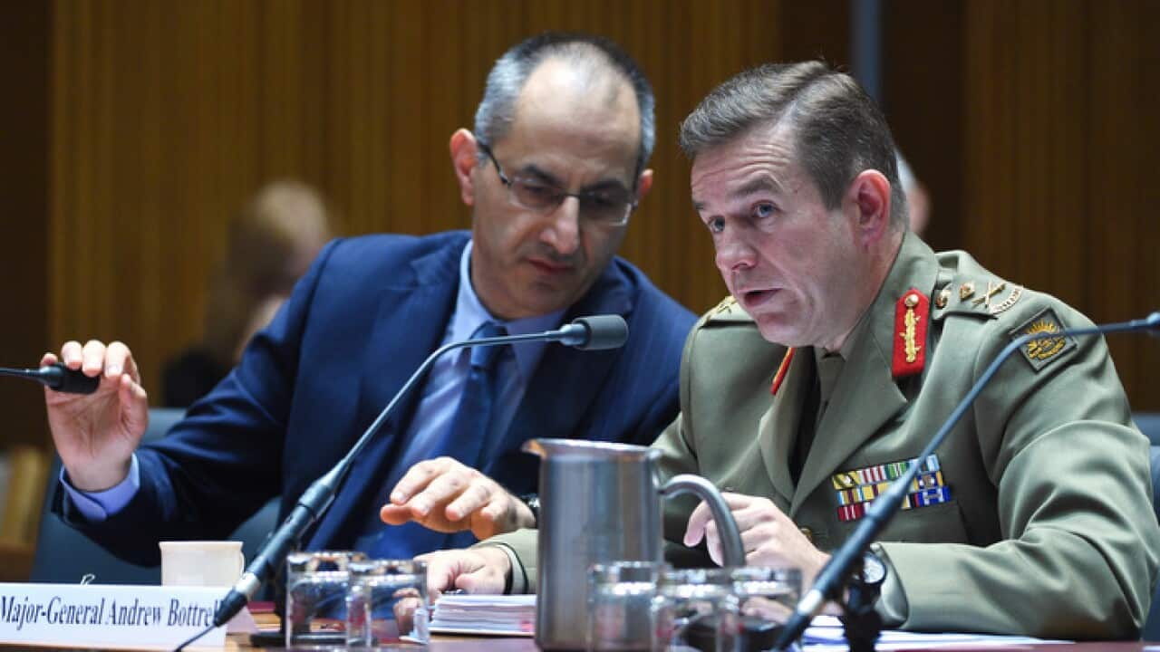 Department of Immigration and Border Protection Secretary Michael Pezzullo (L) and Operation Sovereign Borders Commander Major General Andrew Bottrell at a Senate Inquiry at Parliament House in Canberra on Friday, Feb. 5, 2016.