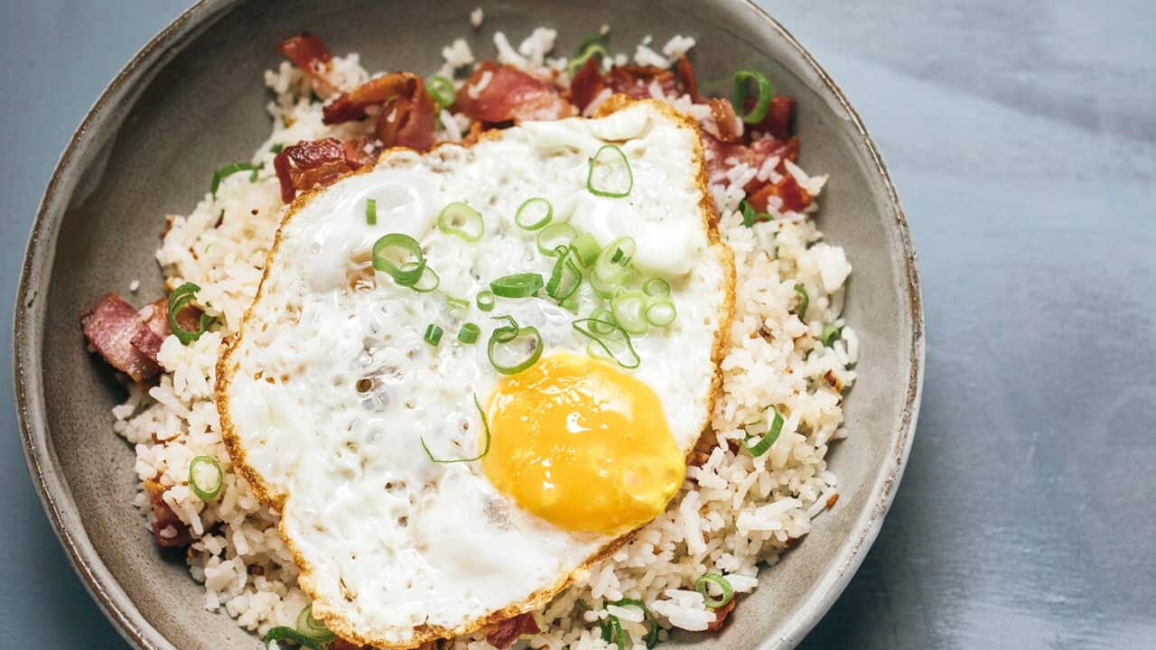 Filipino garlic fried rice with bacon and egg