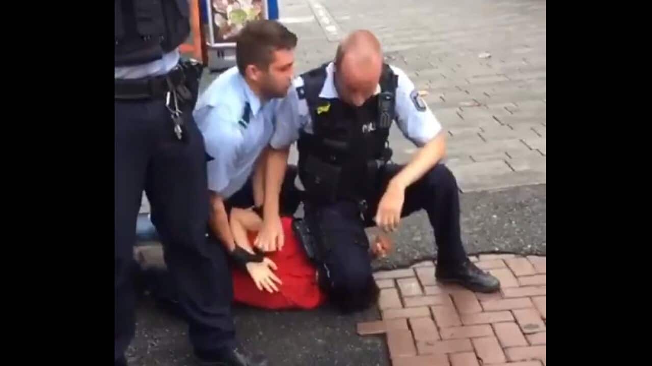 Footage on social media showed two officers, one with his knee first on a prone suspect’s head before it shifted to his neck.