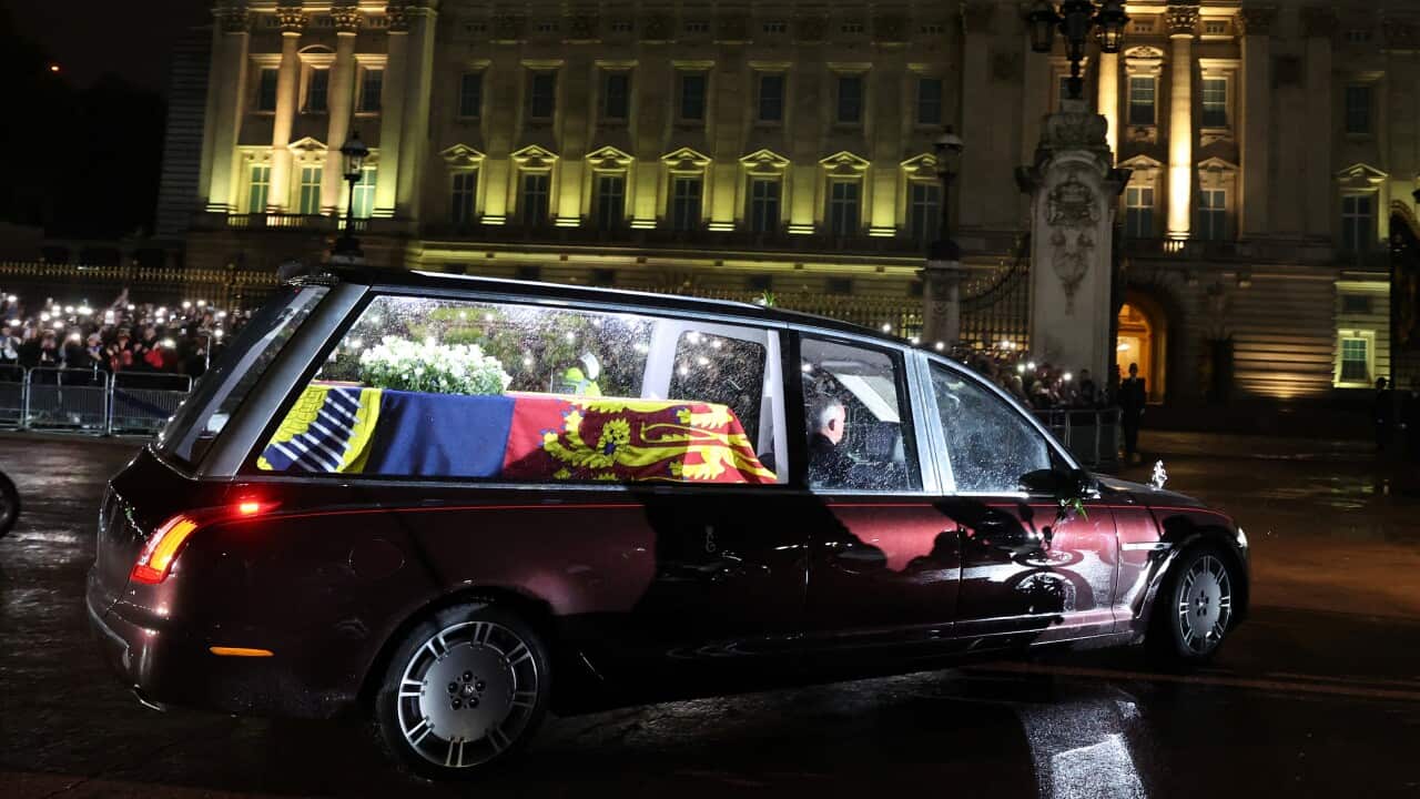 The hearse carrying the coffin of Queen Elizabeth II arrives at Buckingham Palace, London