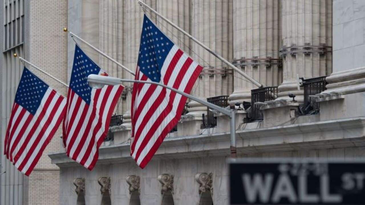 A street sign is seen near the New York Stock Exchange in New York