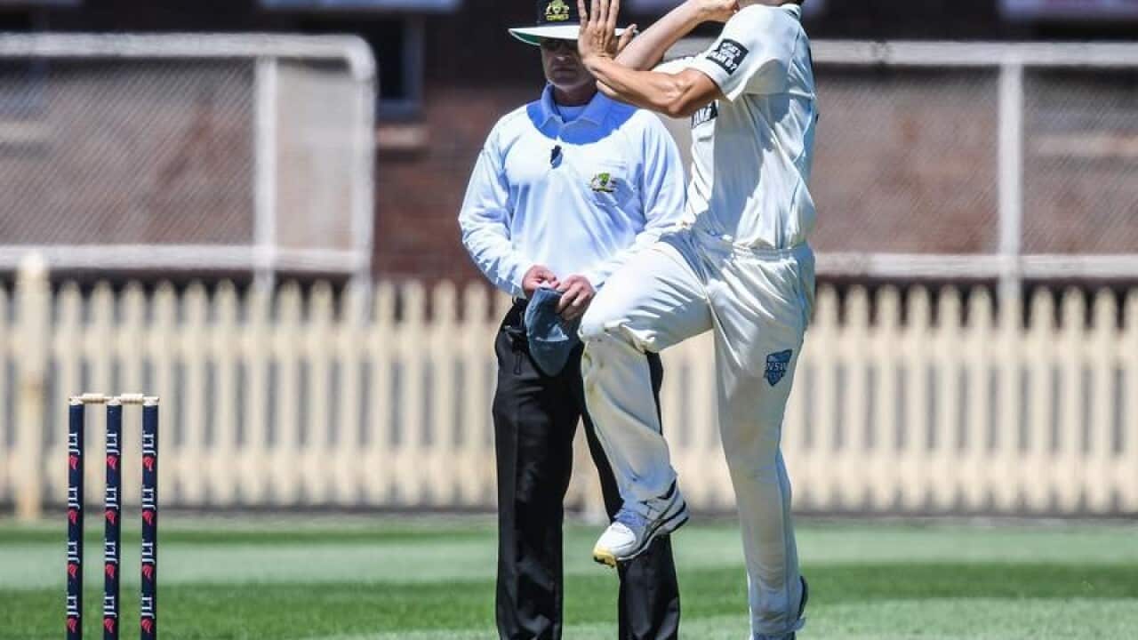 Moises Henriques of NSW bowls