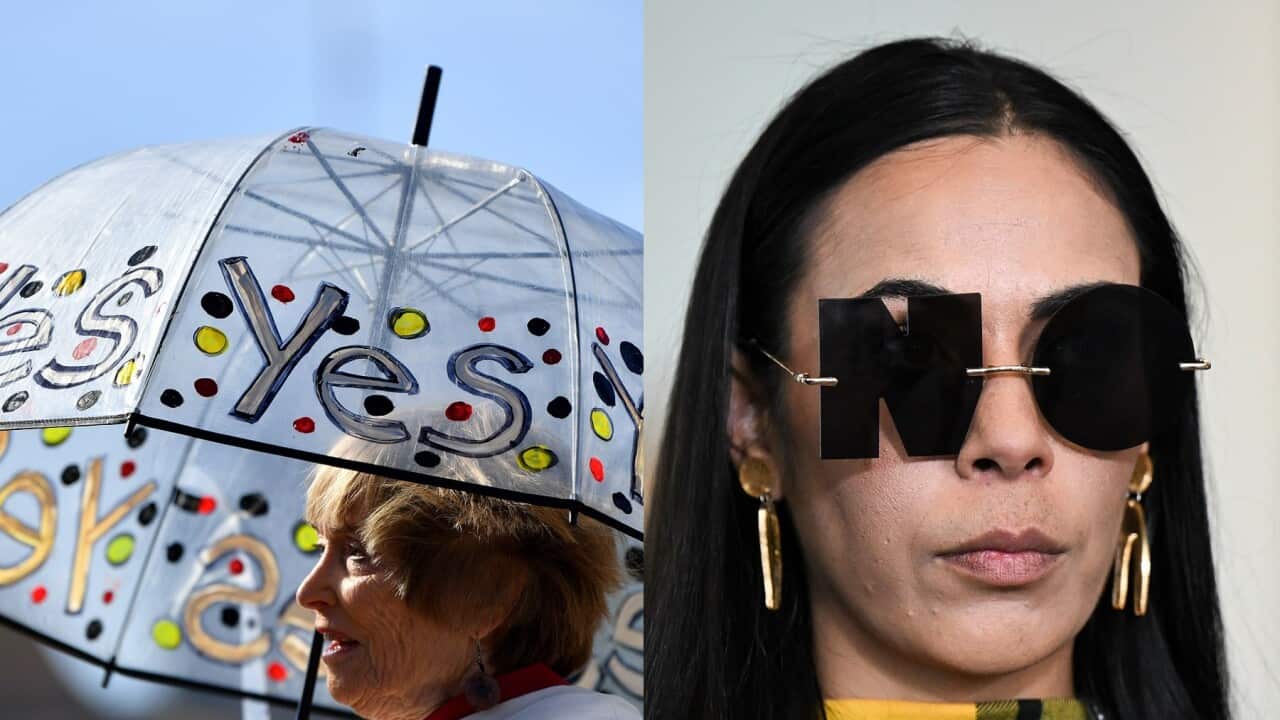 A supporter of that YES vote to Voice in Parliament (AA) and a member of Black Sovereign Movement with NO vote sunglasses (AAP). Source: AAP