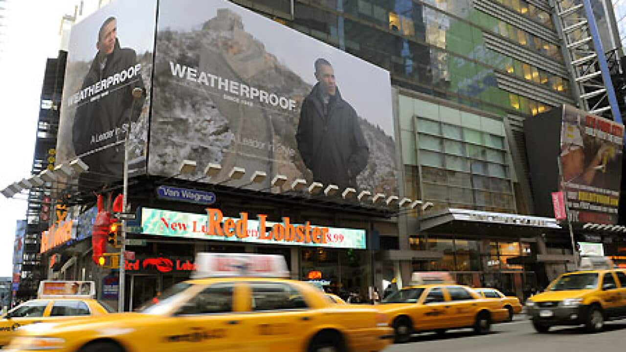 obama_ad_timessquare_100108_afp_getty_B_915663818