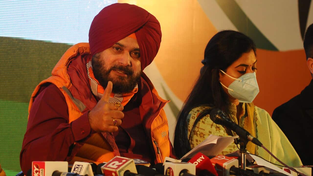 Punjab Pradesh Congress Committee (PPCC) president Navjot Singh Sidhu with other Congress leaders interacts with media during a press conference.