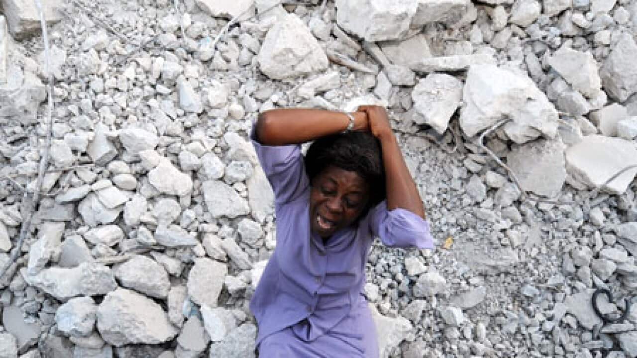 haiti_woman_cries_rubble_100125_B_getty_1741002173