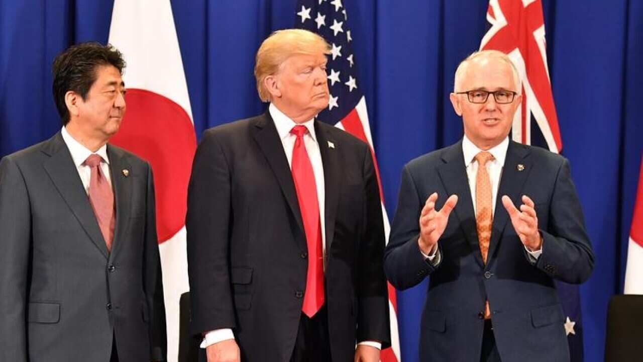 Malcolm turnbull with Donald Trump and Shinzo Abe