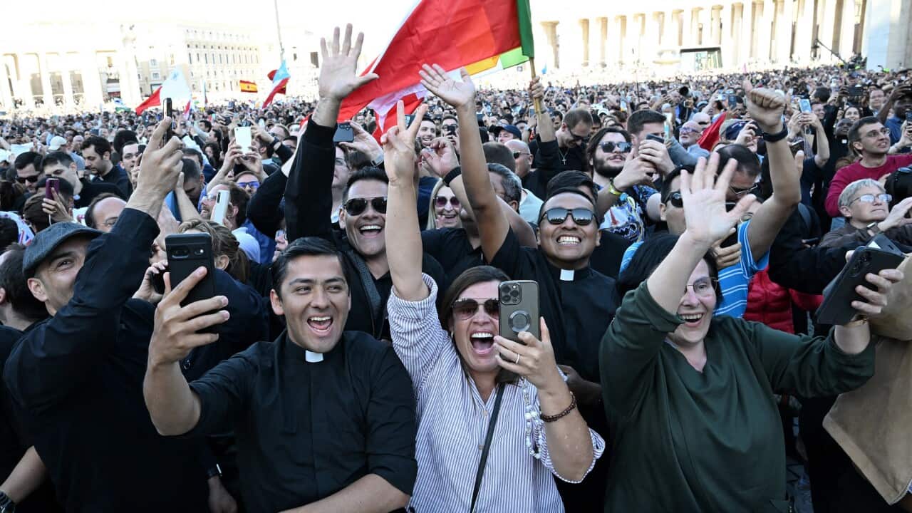 People from all over the world celebrate in Saint Peter's Square after the new Pope is announced.