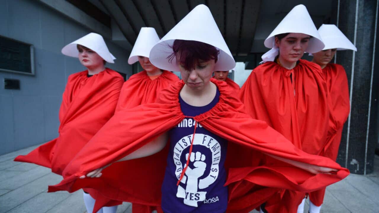 Irish pro-choice campaigners don Handmaid outfits during the abortion referendum campaign.