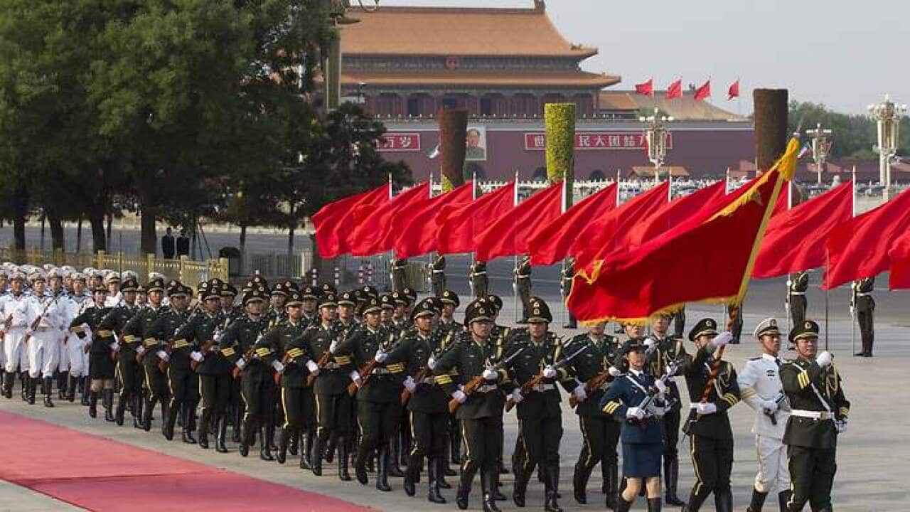Chinese People's Liberation Army (PLA) honor guards march after an official welcoming ceremony at the Great Hall of the People, which is located beside Tiananmen Square in Beijing, China, 03 June 2014.