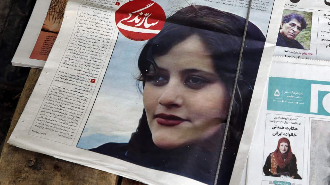 A photo of a woman on the front page of a newspaper