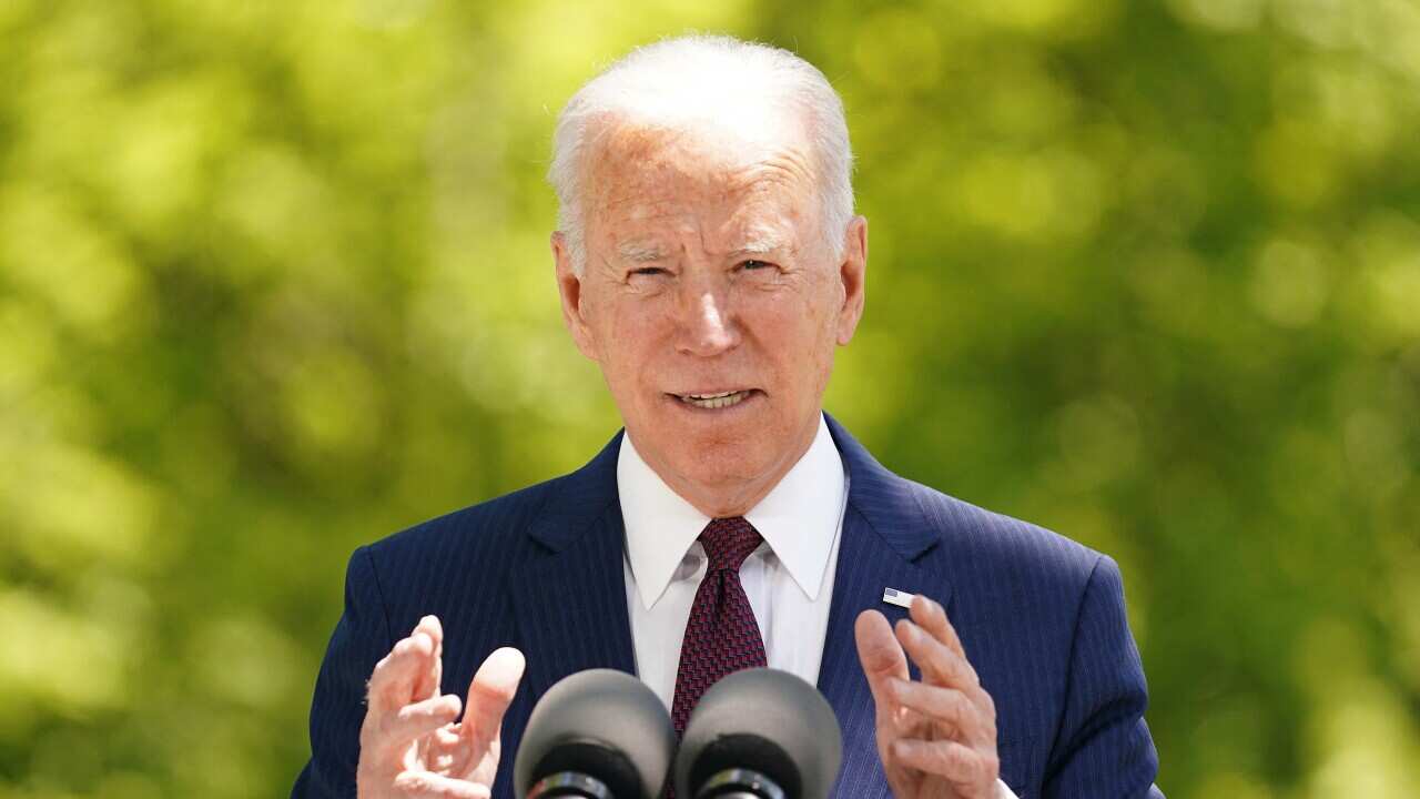 US President Joe Biden speaks on the North Lawn of the White House in Washington DC about the country's COVID-19 progress