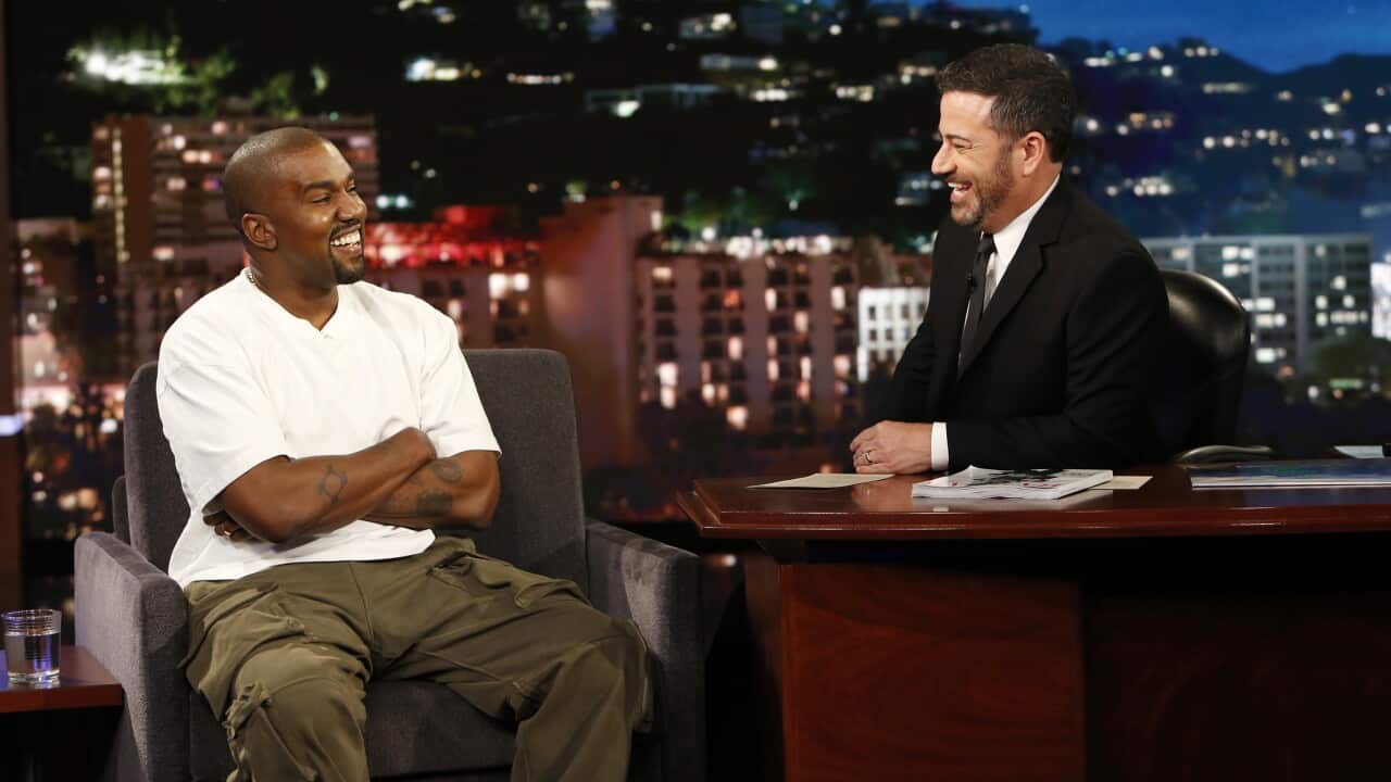 In this image released by ABC, musician Kanye west, left, and host Jimmy Kimmel appear on the set of "Jimmy Kimmel Live!" in Los Angeles.