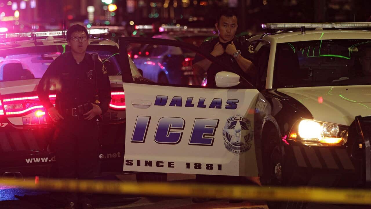 Dallas police officers gather in Downtown after eleven police officers were shot during a peaceful protest in Dallas, Texas, USA, 08 July 2016.