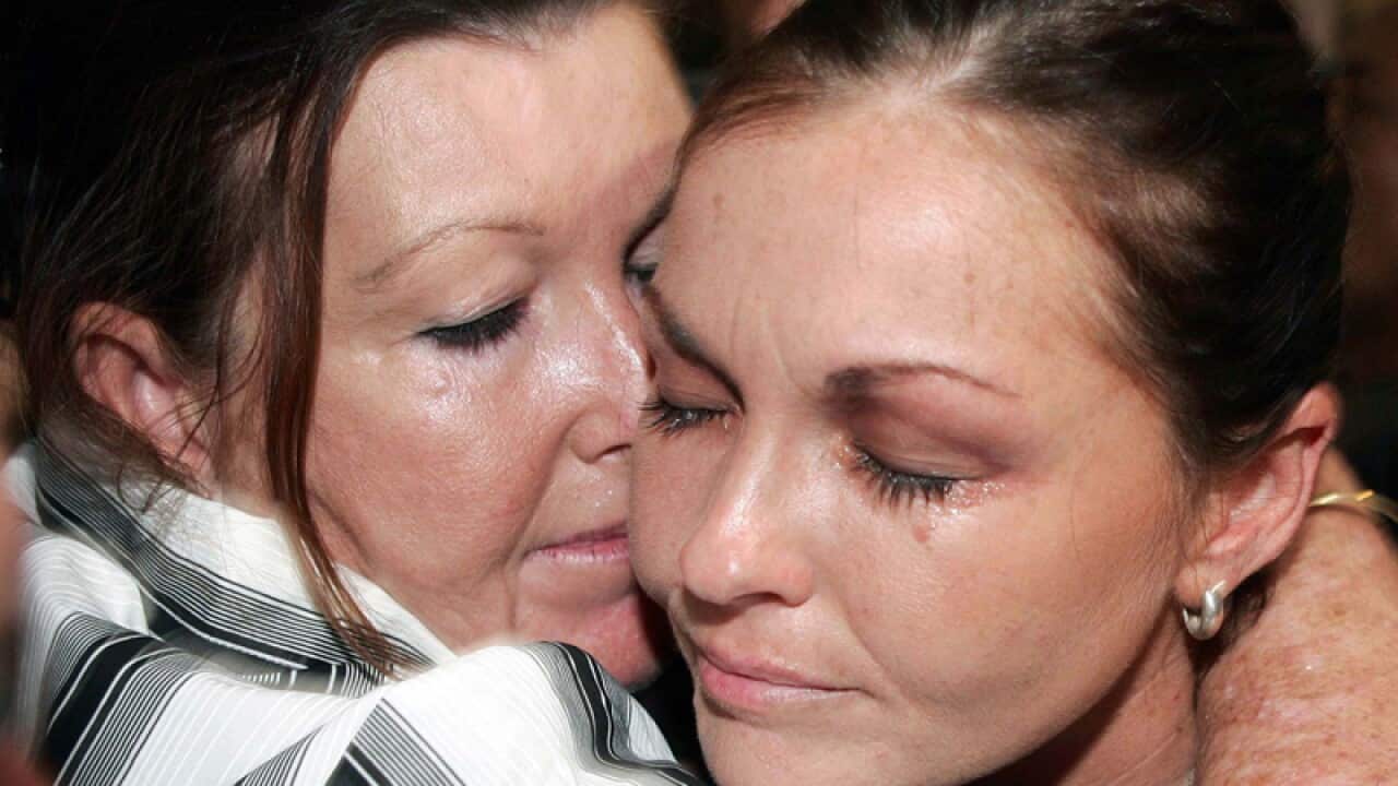 Australian Schapelle Corby (right) receives a kiss from her mother