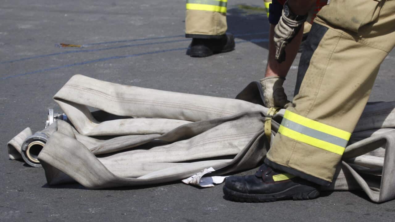 Firefighters at the scene of a fire
