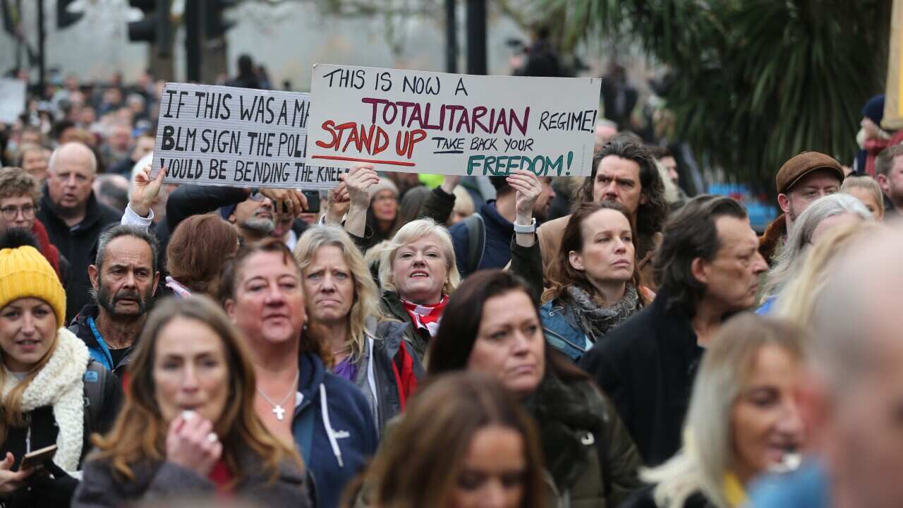 Anti-lockdown and anti-vaccine protesters stage a march in central London, England on 28 November , 2020.