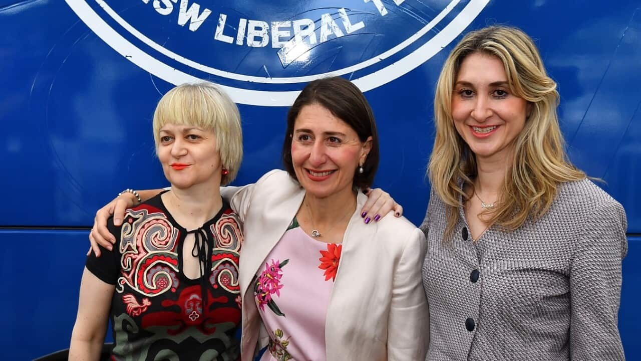 New South Wales Premier Gladys Berejiklian (centre) poses for a photograph with sisters Rita (left) and Mary (right).