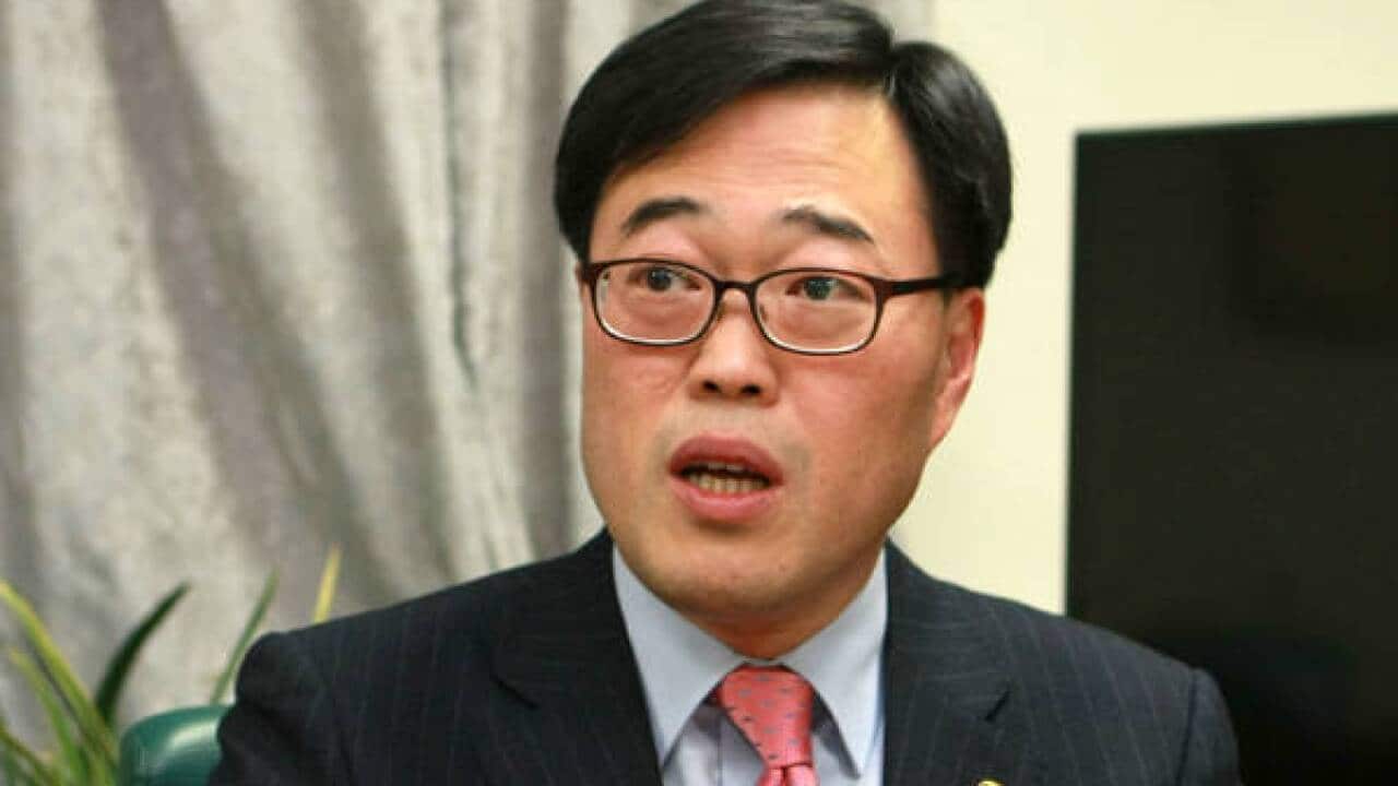 Financial Supervisory Service (FSS) chief Kim Ki-sik grilled in travel rows
