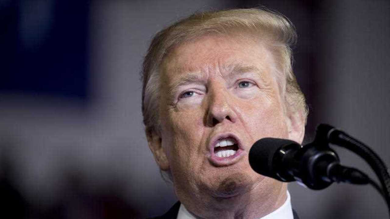President Donald Trump speaks at a rally at Alumni Coliseum in Richmond, Ky., Saturday, Oct. 13, 2018.