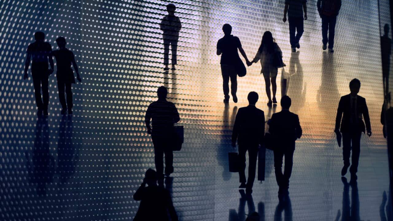 Silhouette of people walking (Getty Images/EschCollection)