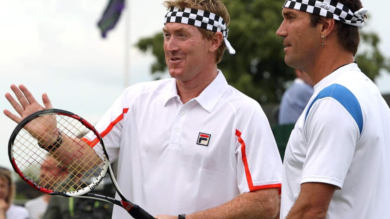 Mark Woodforde (L) and Pat Cash