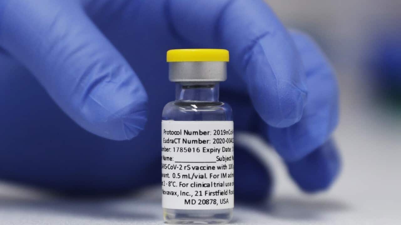 FILE - In this Wednesday, Oct. 7, 2020, file photo, a vial of the Phase 3 Novavax coronavirus vaccine is seen ready for use in the trial at St. George's University hospital in London. Novavax says its vaccine appears effective against COVID-19 in a large