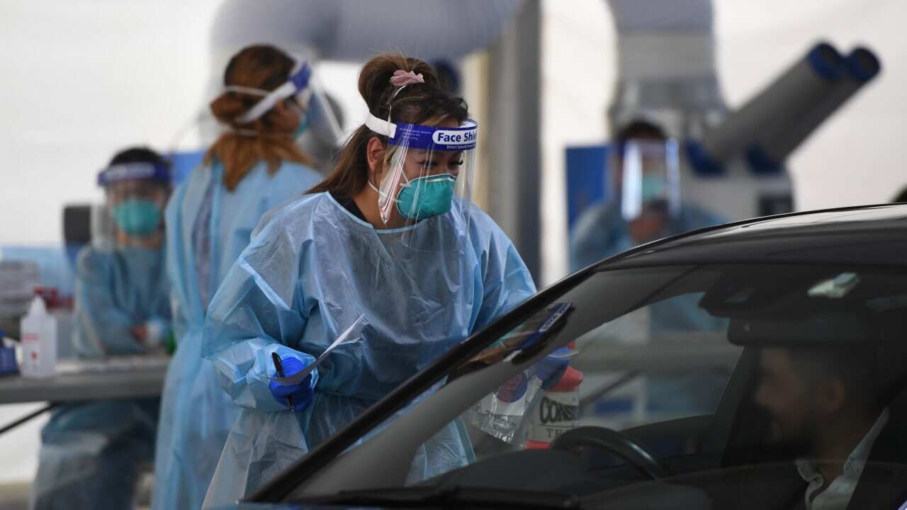 Medical staff work at a pop-up Covid-19 testing site in Brighton, Melbourne.