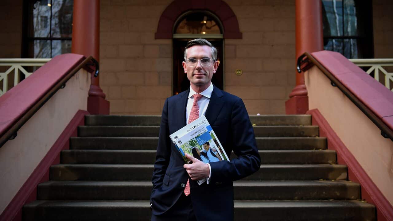 Treasurer Dominic Perrottet poses for a photo outside the NSW Parliament in Sydney, Monday, June 21, 2021. (AAP Image/Joel Carrett) NO ARCHIVING
