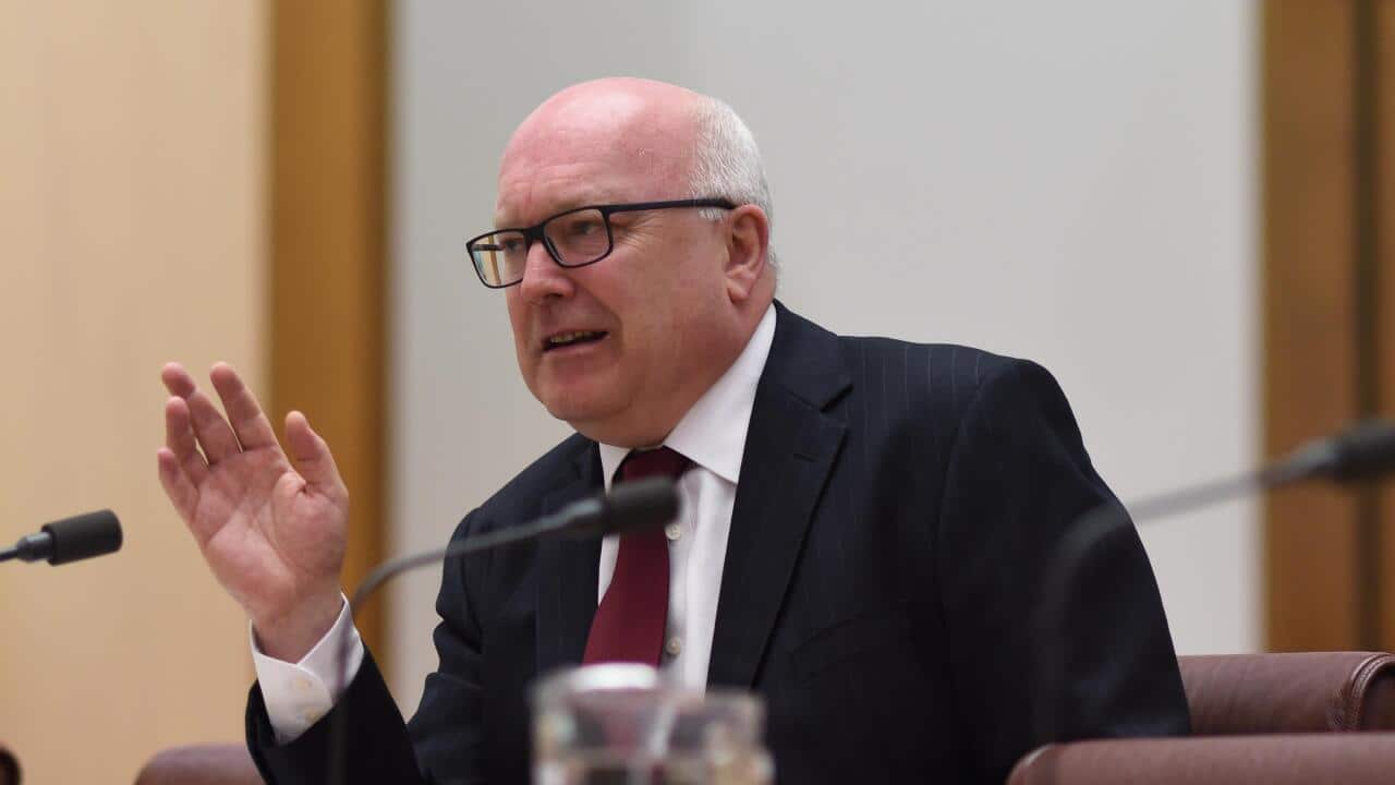 George Brandis appears before the Senate Committee in Canberra