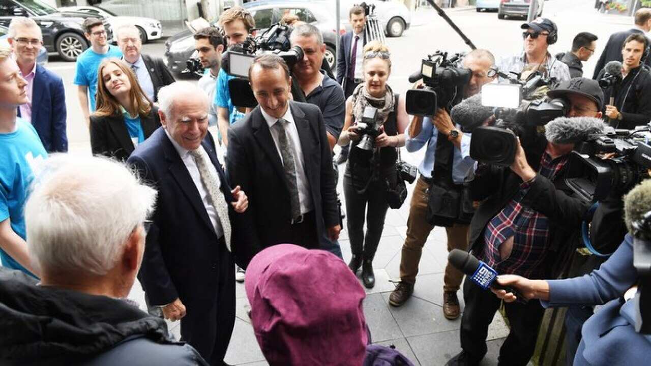 Former prime minister John Howard campaigning with the Liberal candidate for Wentworth Dave Sharma ahead of this weekend's by-election.