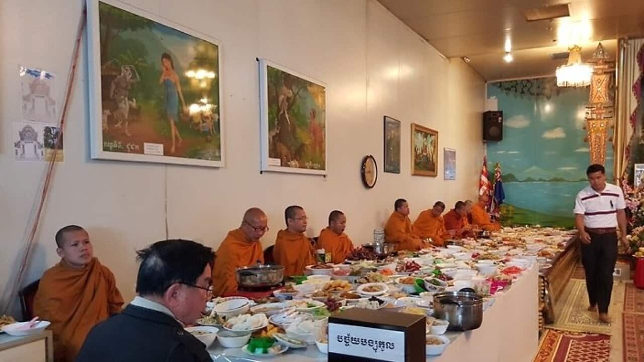 Buddhist monks in temple in Melbourne
