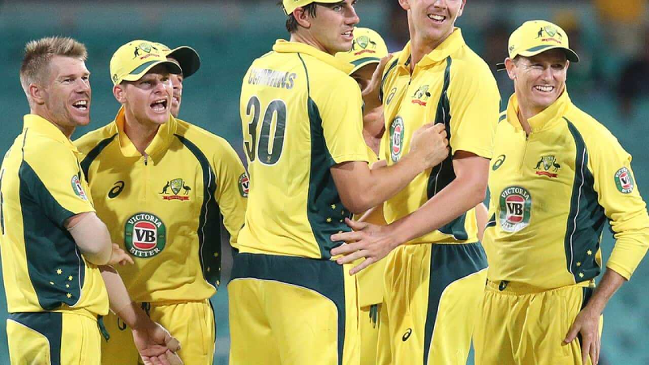 Australia's Josh Hazelwood celebrates with his teammates