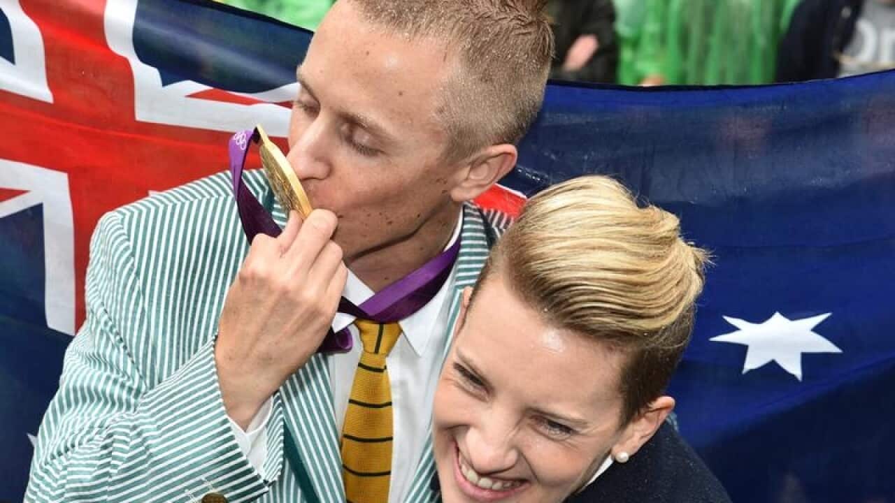 Australian athlete Jared Tallent (L) and his wife Claire